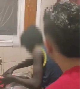 Egyptian citizen assaulting a Sudanese child